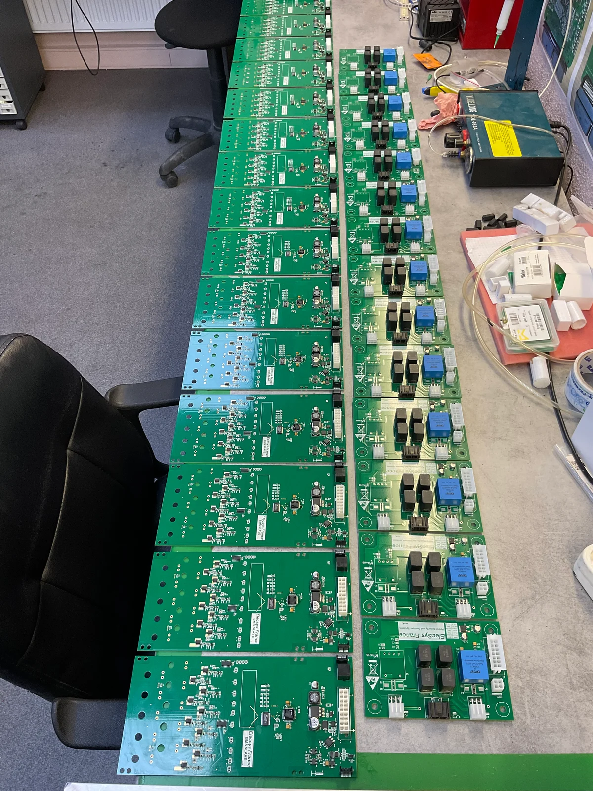 Rows of battery-management circuit boards (BMS) I assembled