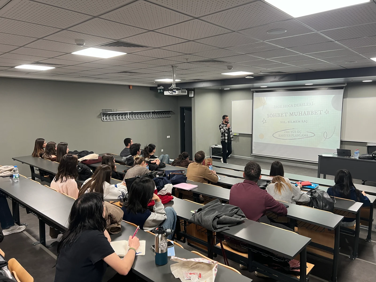 Giving a talk in a Çankaya University seminar hall